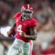 Alabama Crimson Tide quarterback Jalen Milroe (4) carries the ball against the Vanderbilt Commodores during the second half at Bryant-Denny Stadium.